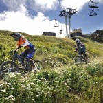 Downhill riders on the Abom Village Link track